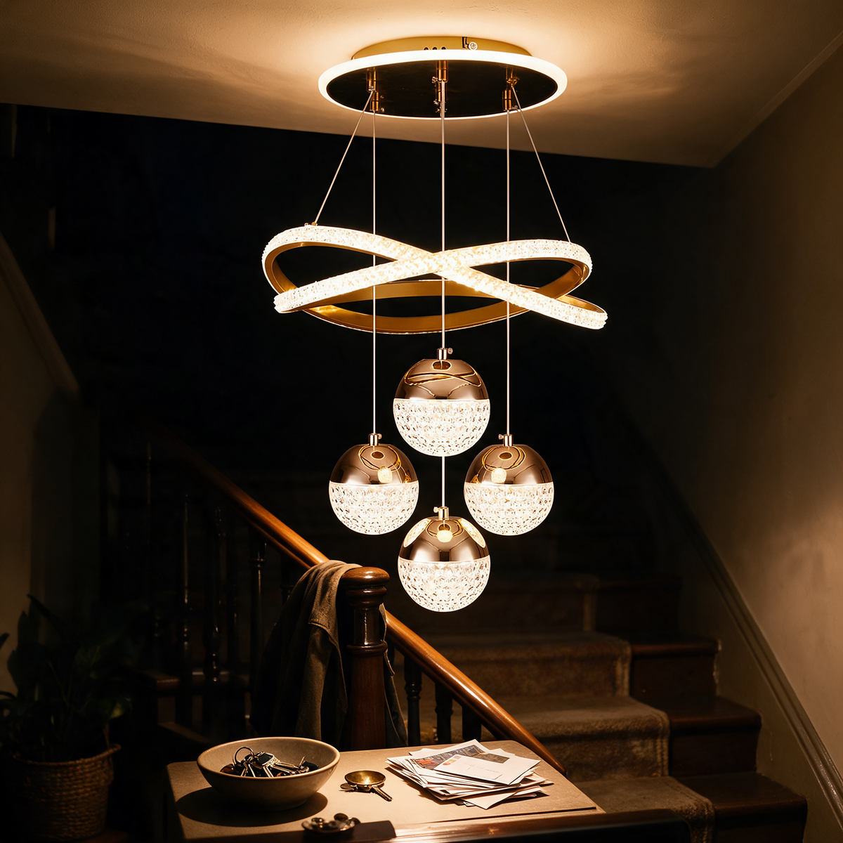 Pendant chandelier above an entrance hall console table