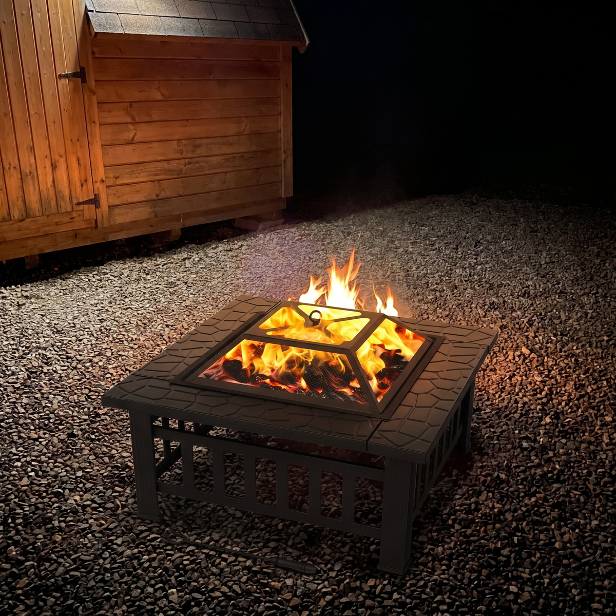 Fire pit outside a cabin at night