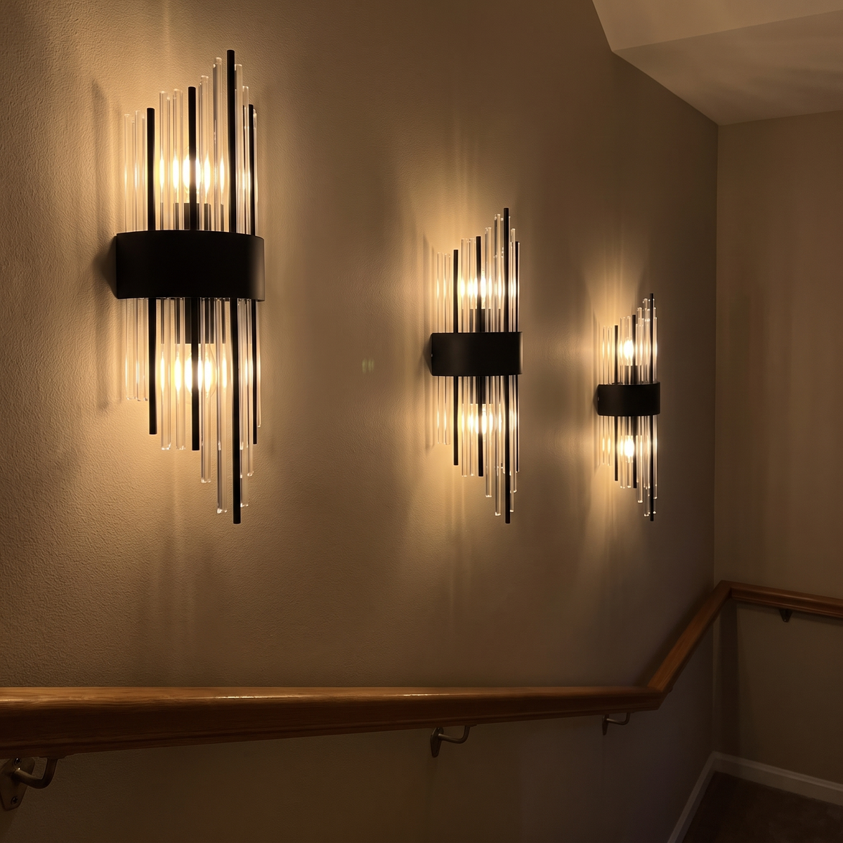 A run of sconces along a stairwell landing