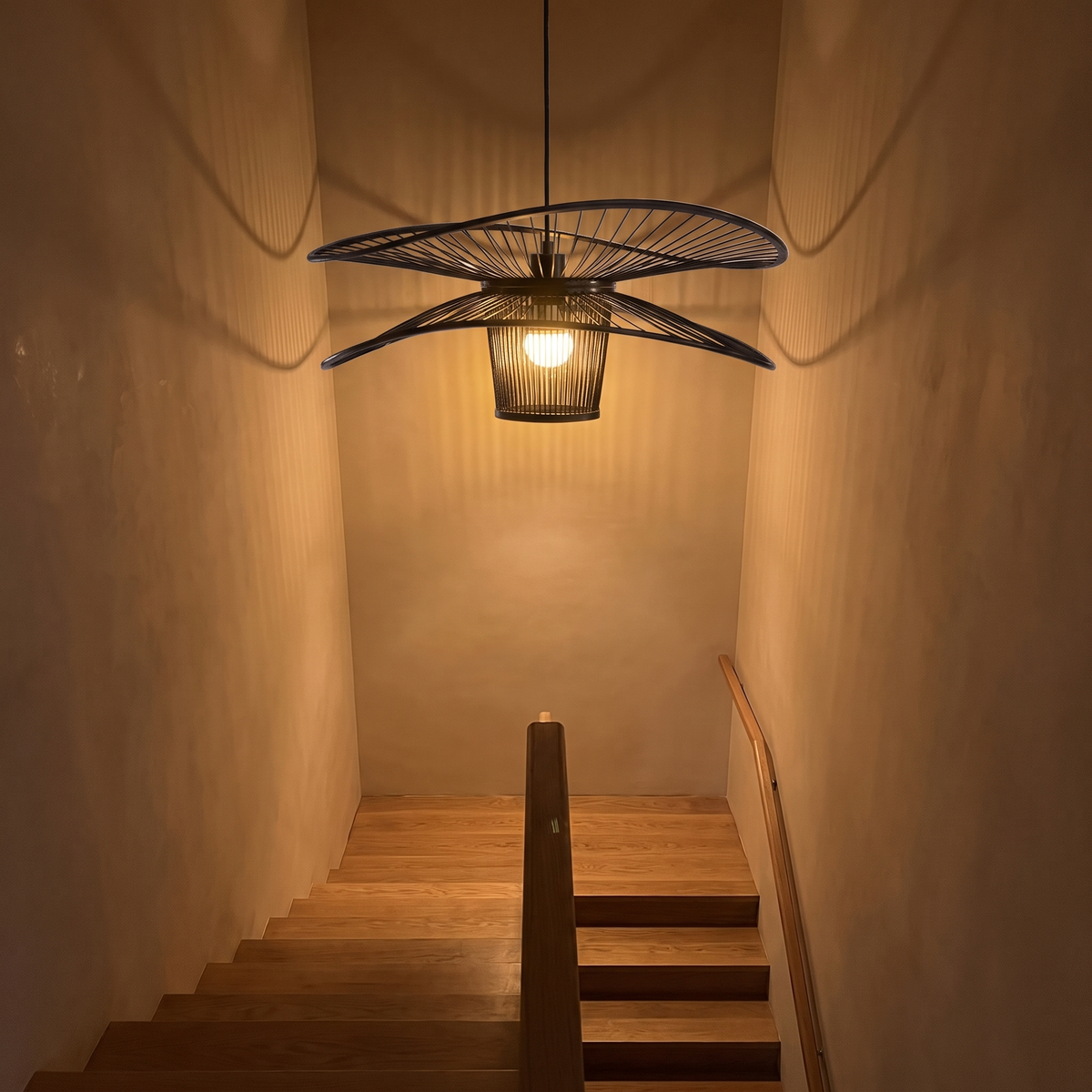 I-trio3 dragonfly pendant above a stairwell