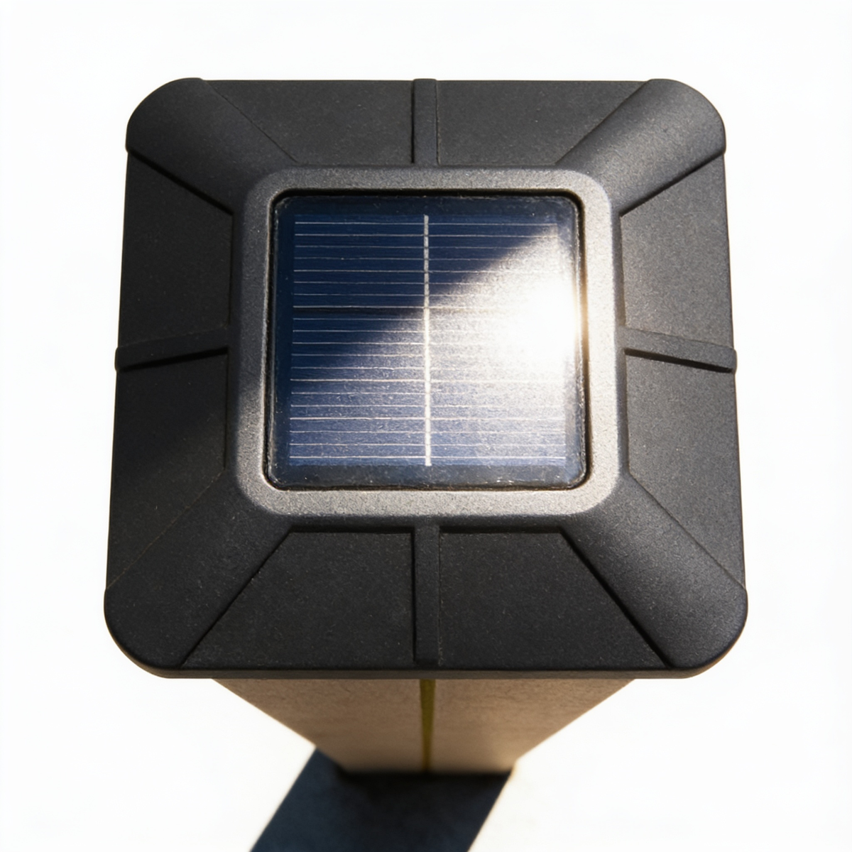 The solar panel set into the top face, charging in daylight