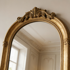Close view of the vintage detailing worked into the gold metal