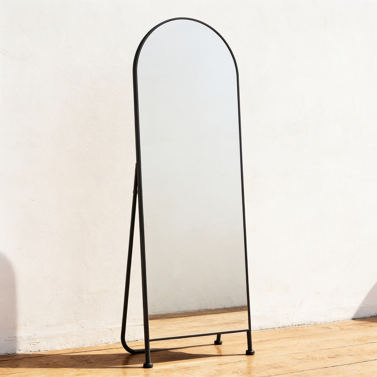 Standing free on the floor with a bare undrilled wall behind