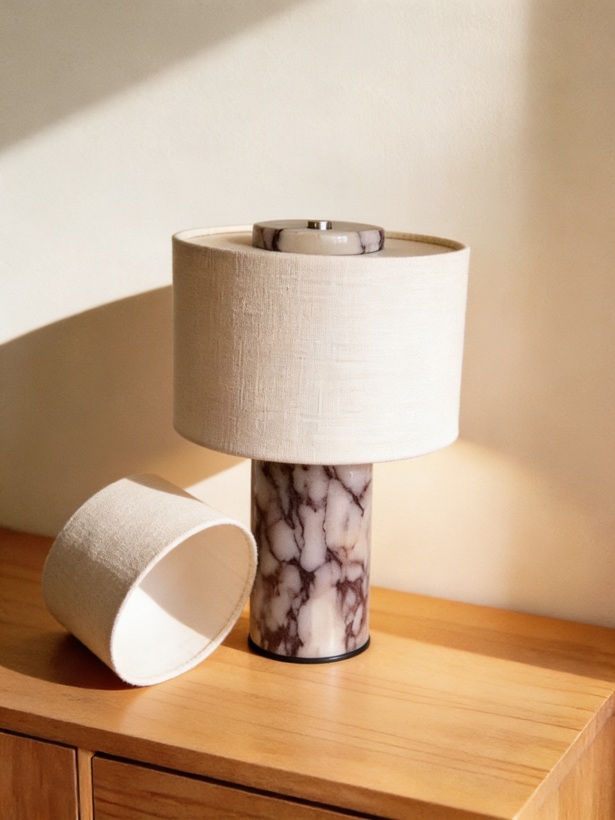The shade lifts off the marble base and can be swapped