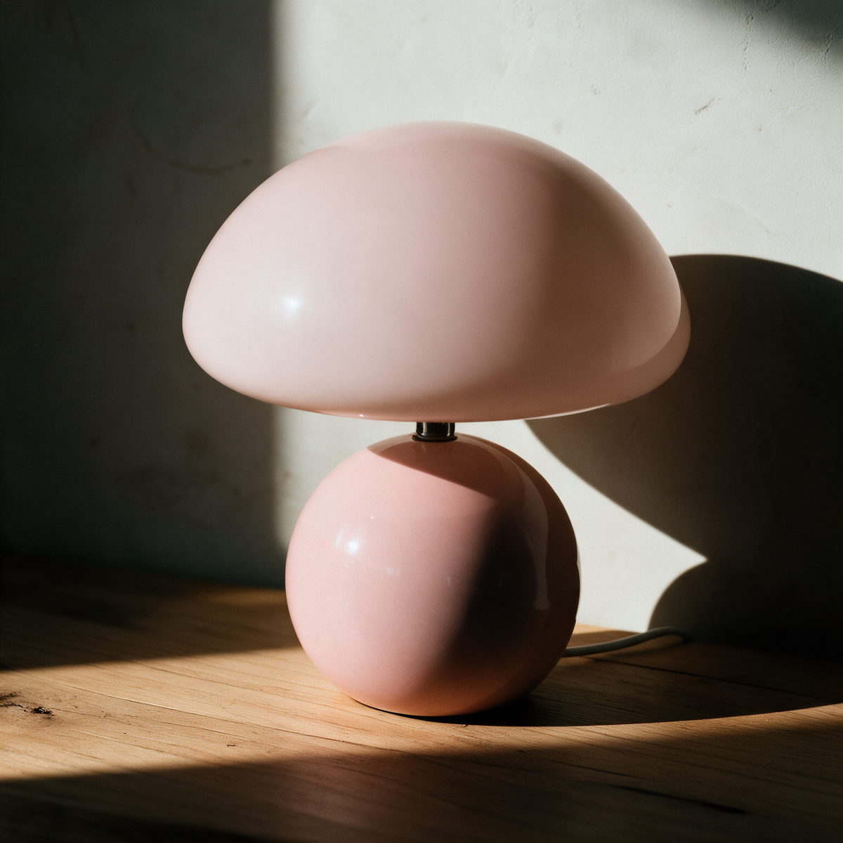 Ceramic Base Mushroom Lamp in Pink on an oak surface